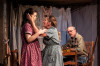 Ma (TimeLine Company Member Mechelle Moe, center) tries to make her daughter Sunny (Angela Morris, left) and husband Pa (TimeLine Company Member David Parkes, right) understand the importance of her mysterious visions in TimeLine Theatre’s world premiere of Black Sunday, Dolores Díaz’s haunting story of climate change, migration, and family in the days leading up to an infamous dust storm in 1930s Texas, directed by Helen Young.