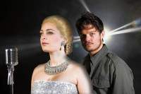 Hannah Corneau as Eva Peron and Austin Lesch as Che in "Evita" now playing at Marriott Theatre