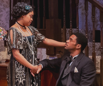 Annelle (Ayanna Bria Bakari, left) tries to comfort her husband Marcus (Travis Delgado).